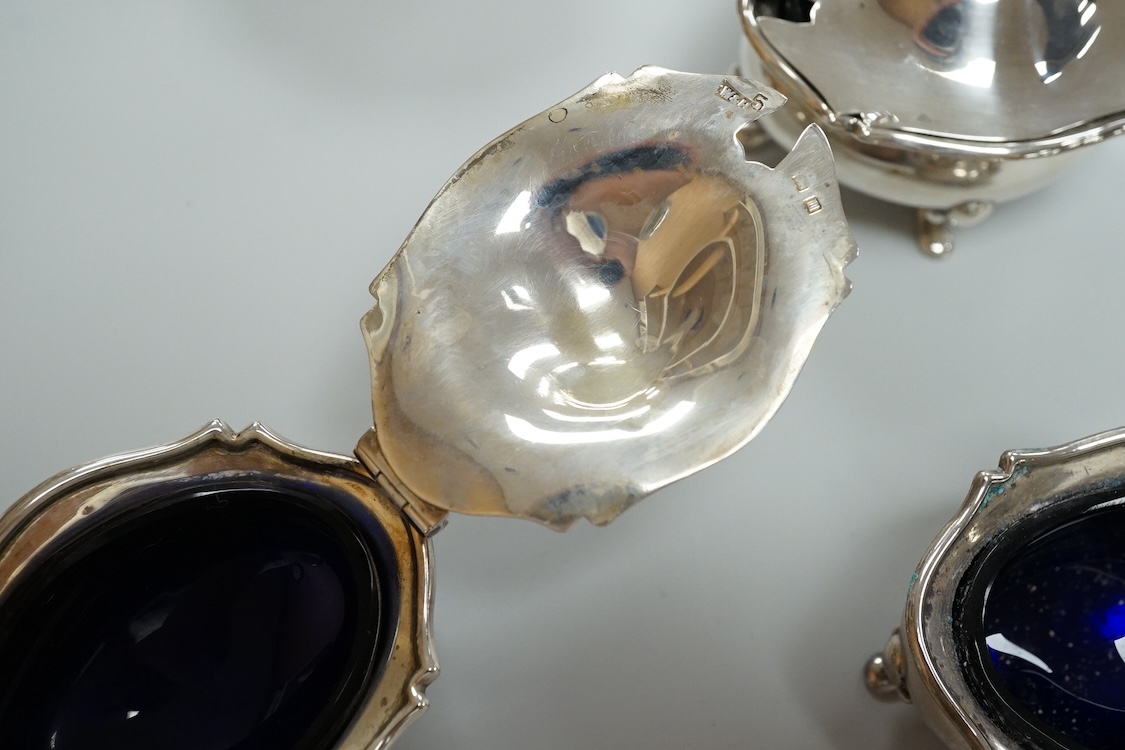 A George V eight piece silver cruet set by Walker & Hall, Birmingham, 1923, lacking spoons.